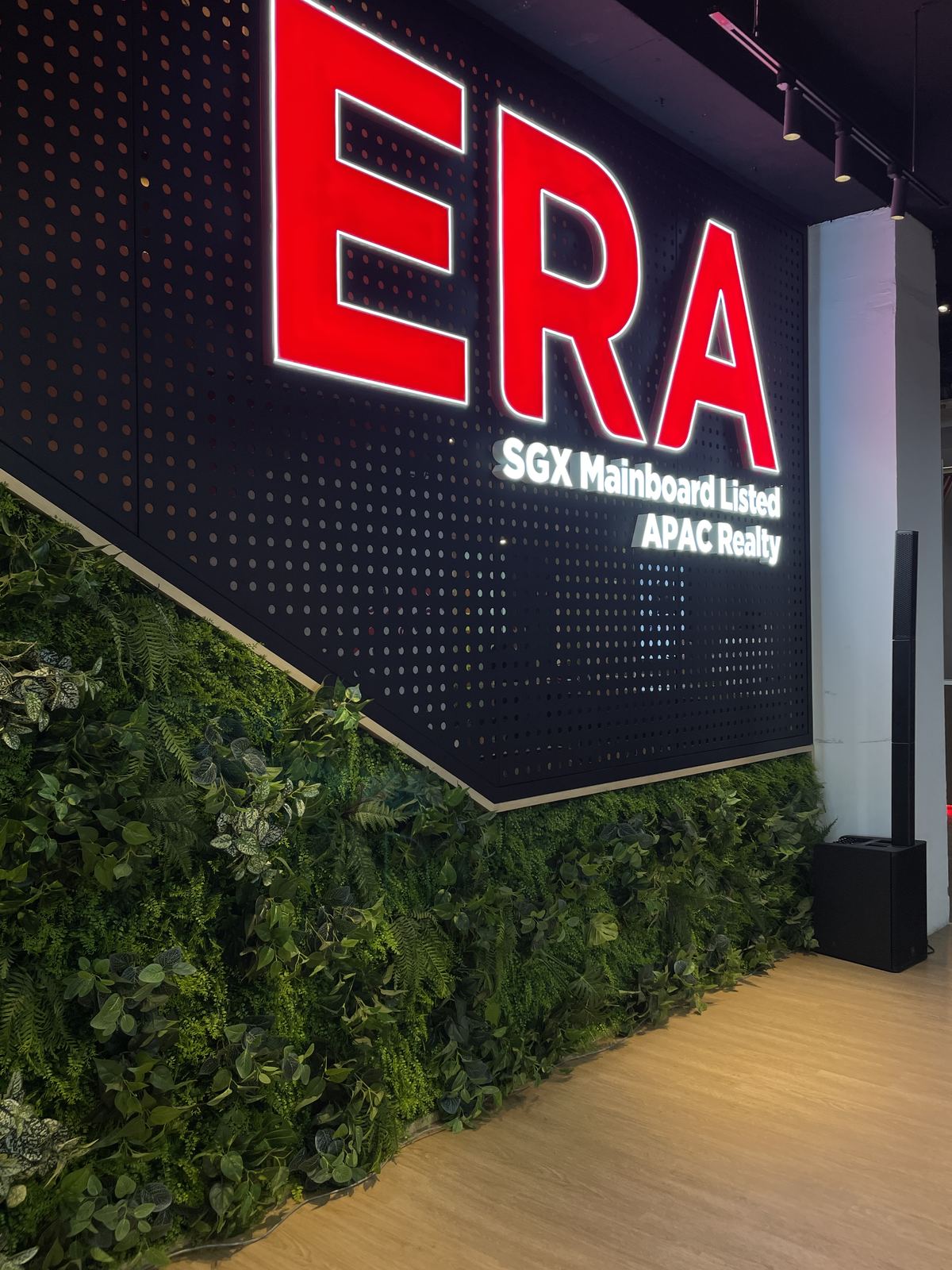 ERA &mdash; sgx-listed lettering · green wall