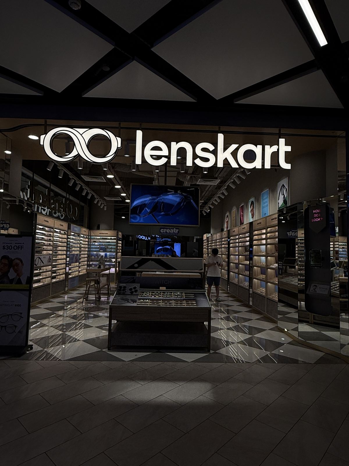 Lenskart &mdash; front-lit shopfront lockup