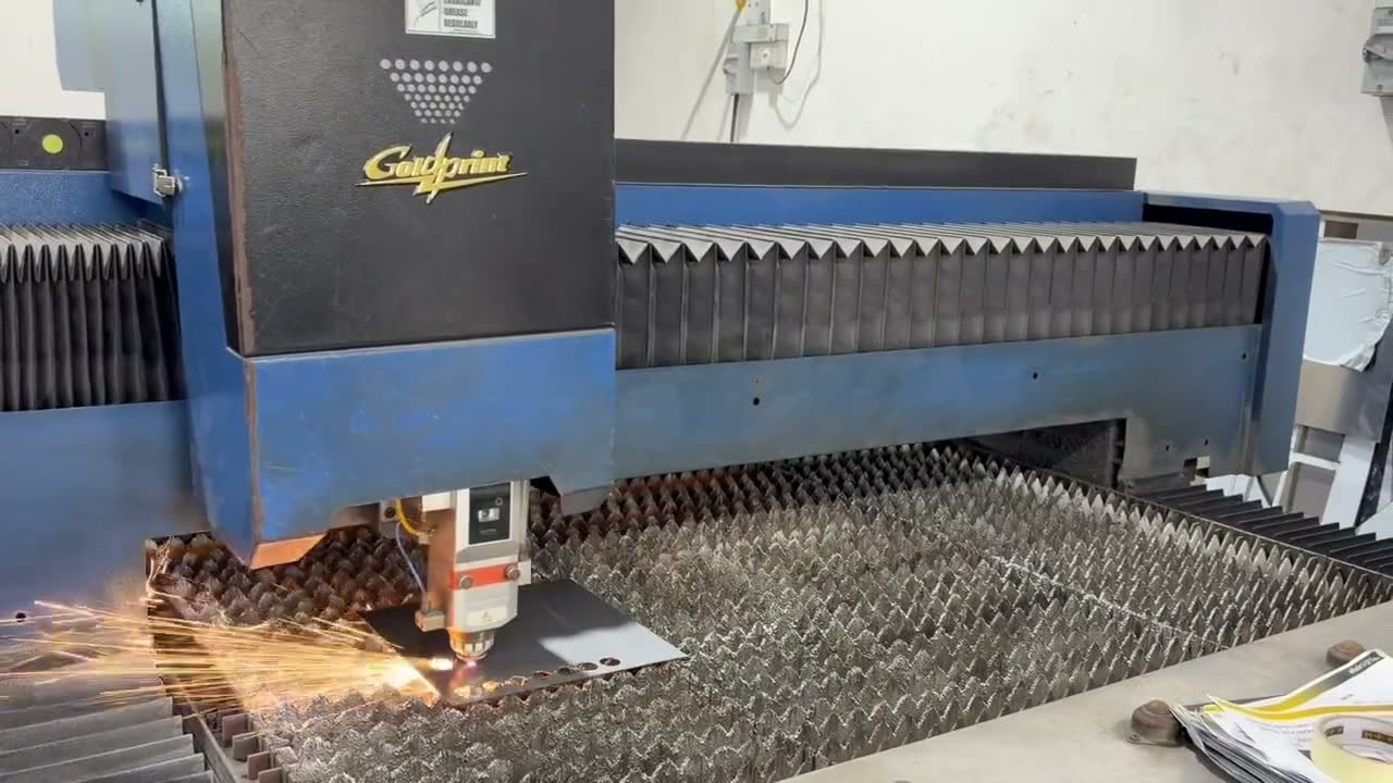Metal being laser-cut in the Bedok factory